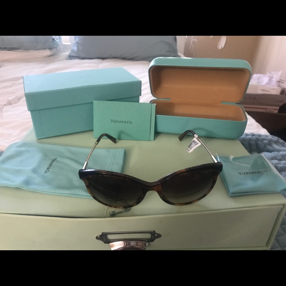 Tiffany’s sunglasses and case set new with tags